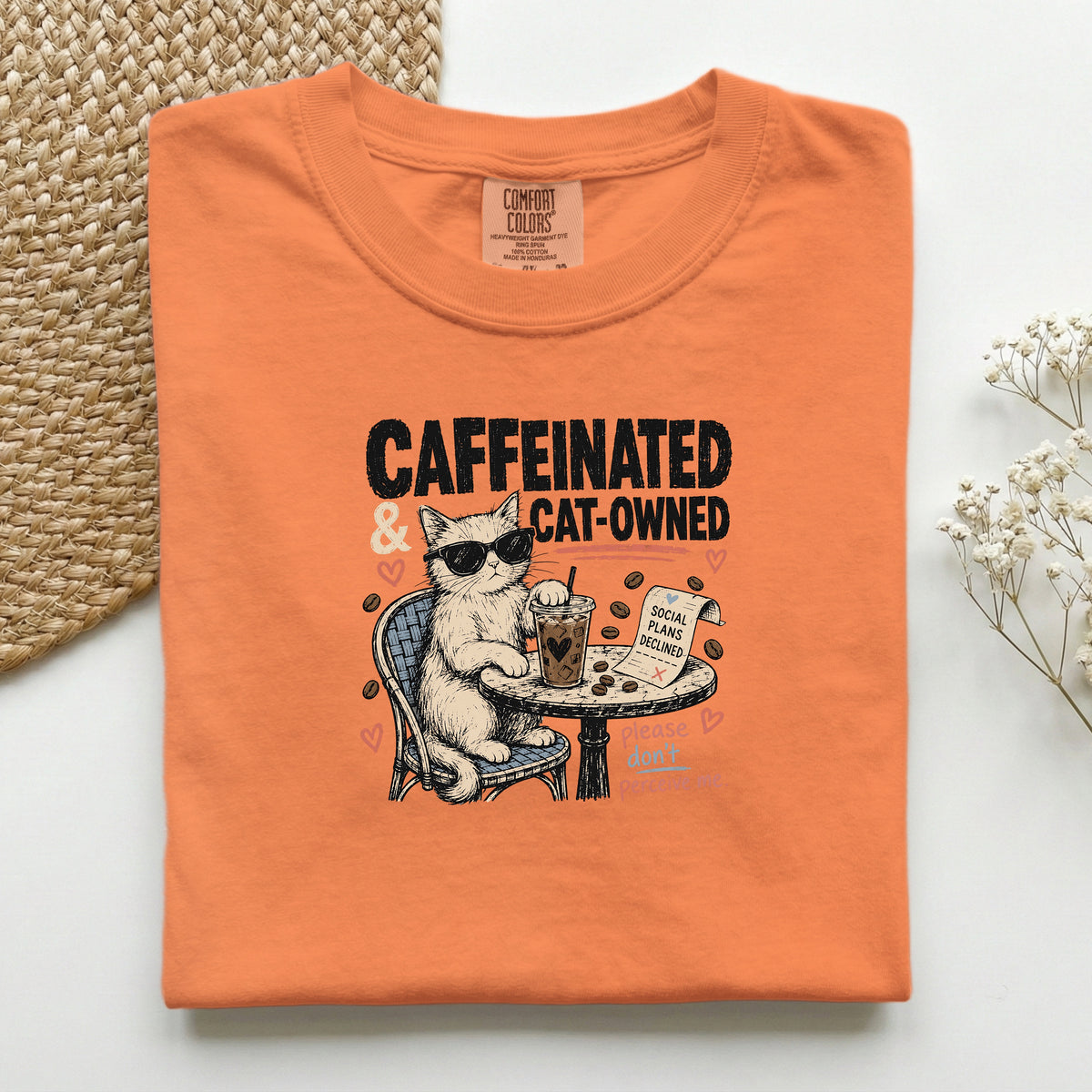 Caffeinated and Cat Owned graphic tee in Burnt Orange, folded flat lay