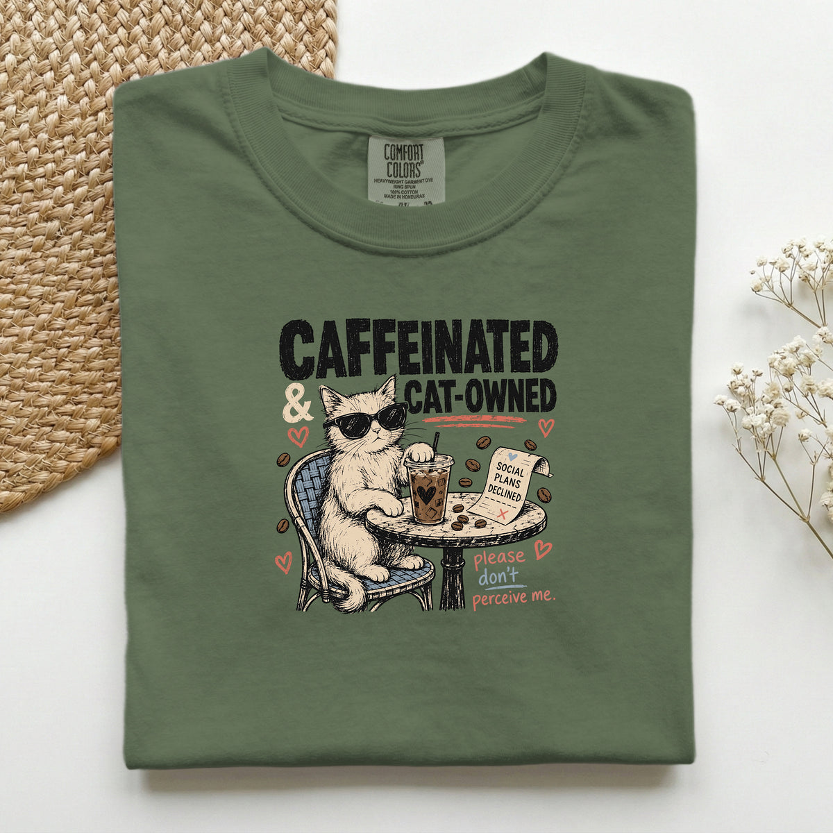 Caffeinated and Cat Owned graphic tee in Hemp, folded flat lay