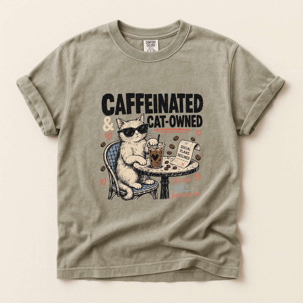 Caffeinated and Cat Owned graphic tee in Khaki, folded flat lay