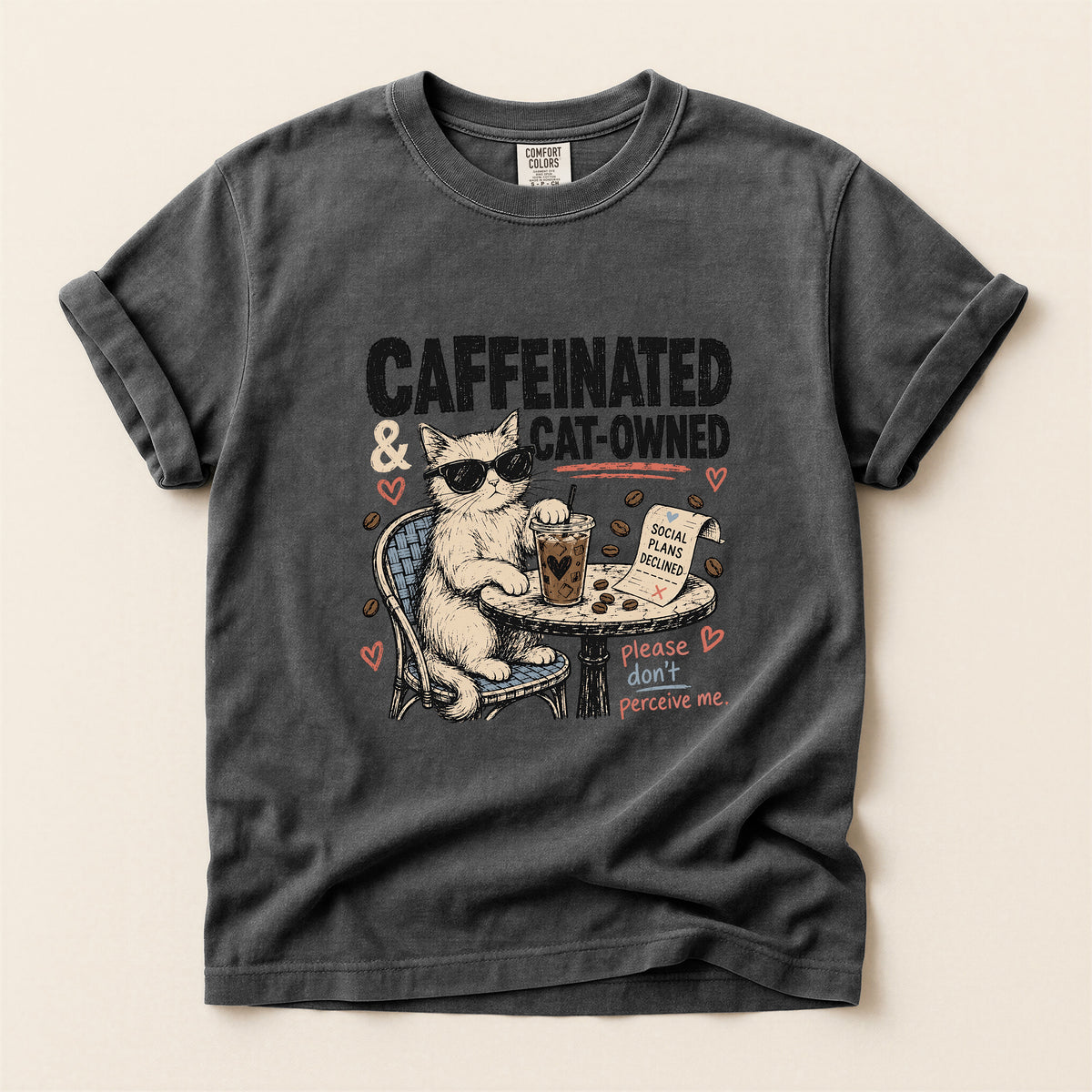 Caffeinated and Cat Owned graphic tee in Pepper, folded flat lay