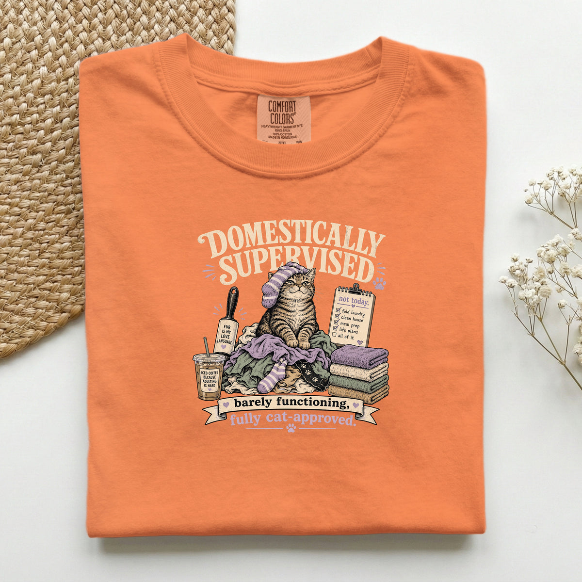 Domestically Supervised graphic tee in Burnt Orange, folded flat lay