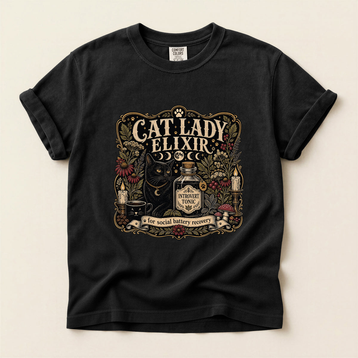 Cat Lady Elixir graphic tee in Black, folded flat lay