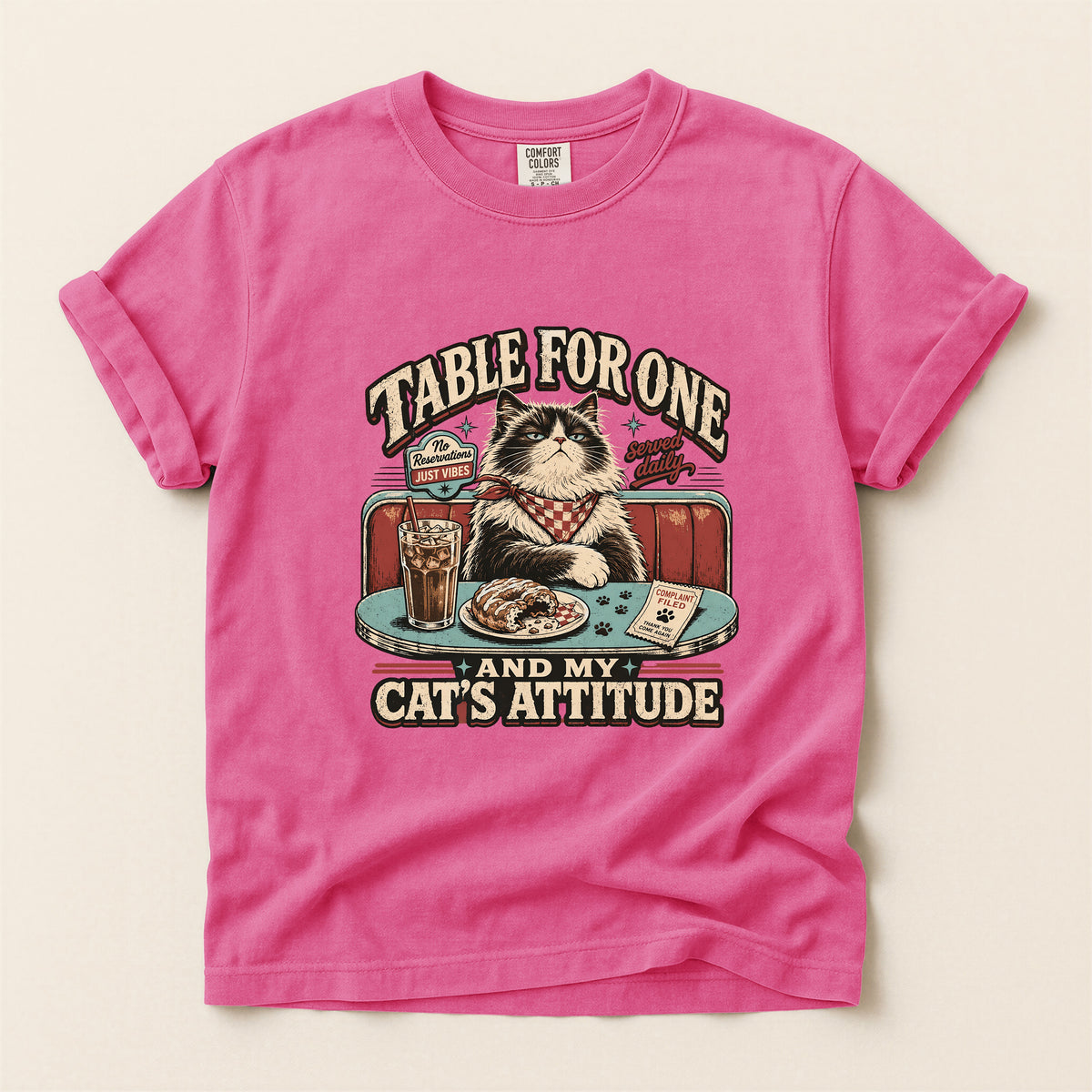 Table For One graphic tee in Crunchberry, folded flat lay