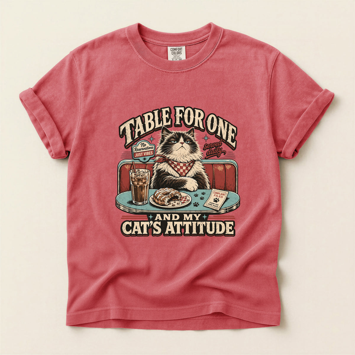 Table For One graphic tee in Watermelon, folded flat lay
