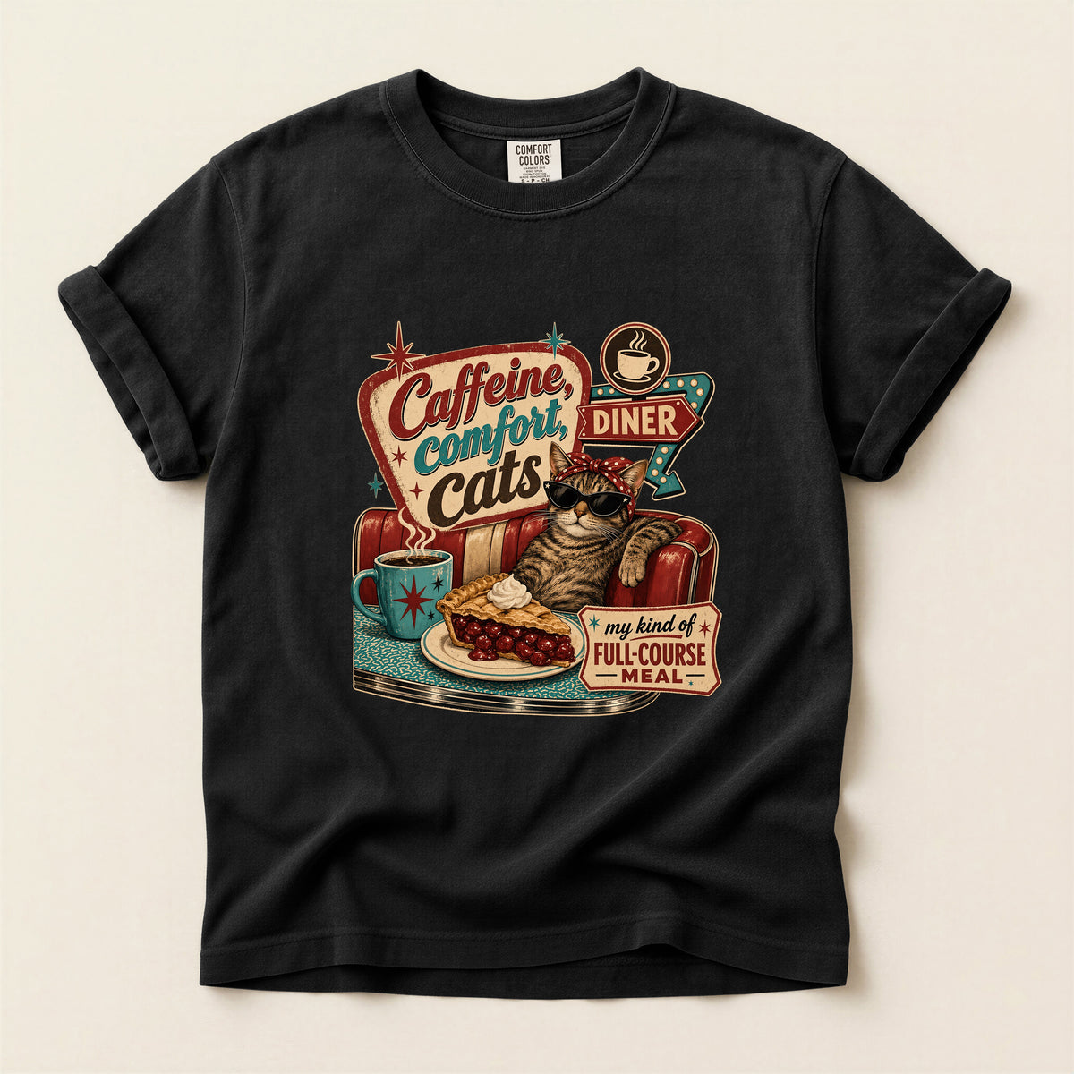 Caffeine Comfort Cats graphic tee in Black, folded flat lay