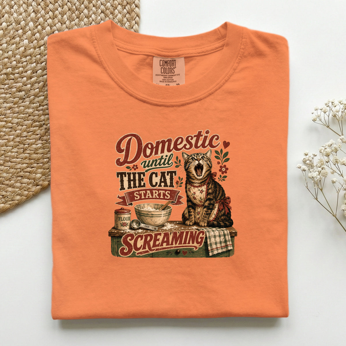 Domestic Until The Cat Starts Screaming graphic tee in Burnt Orange, folded flat lay