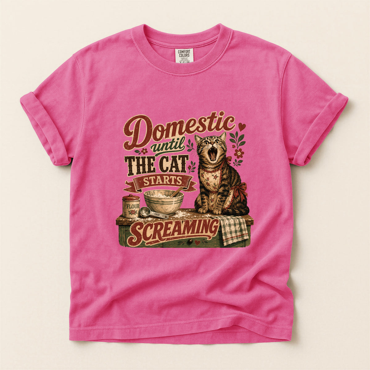 Domestic Until The Cat Starts Screaming graphic tee in Crunchberry, folded flat lay