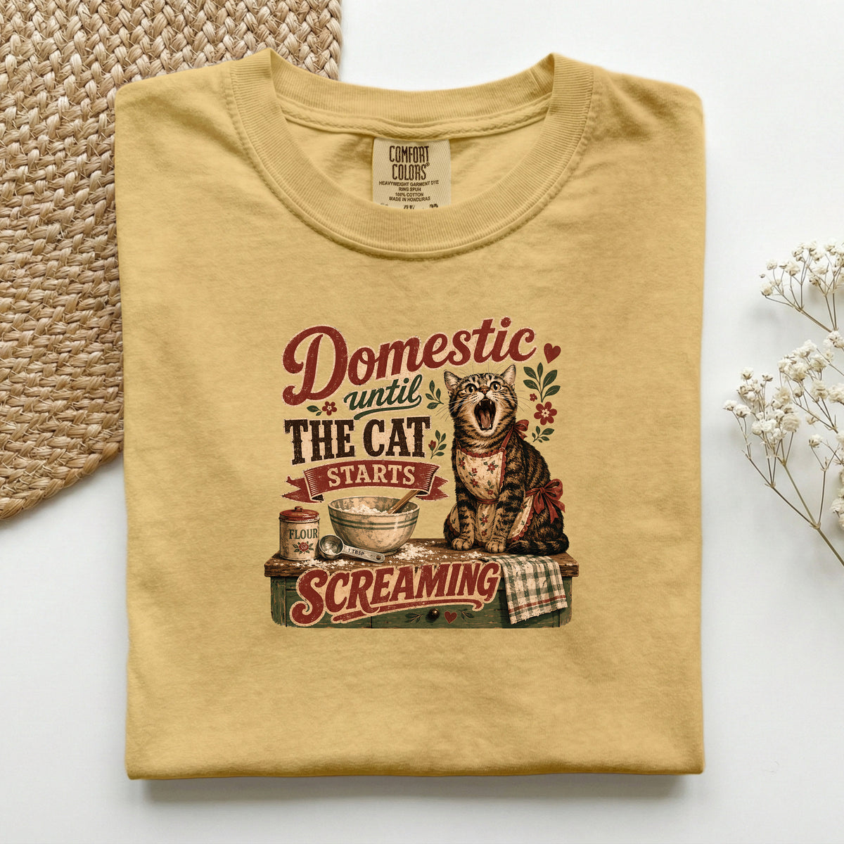 Domestic Until The Cat Starts Screaming graphic tee in Mustard, folded flat lay