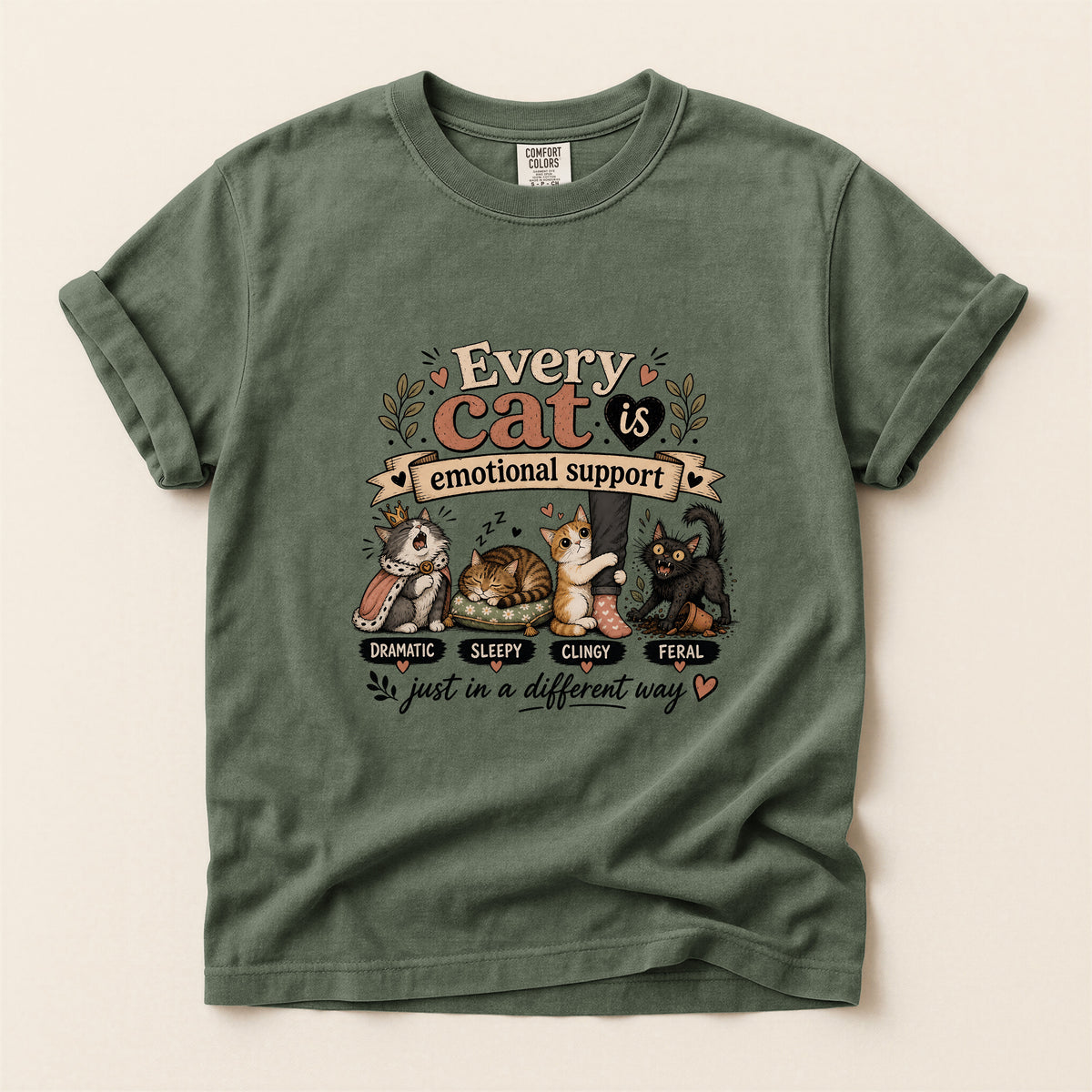 Every Cat Is Emotional Support graphic tee in Moss, folded flat lay