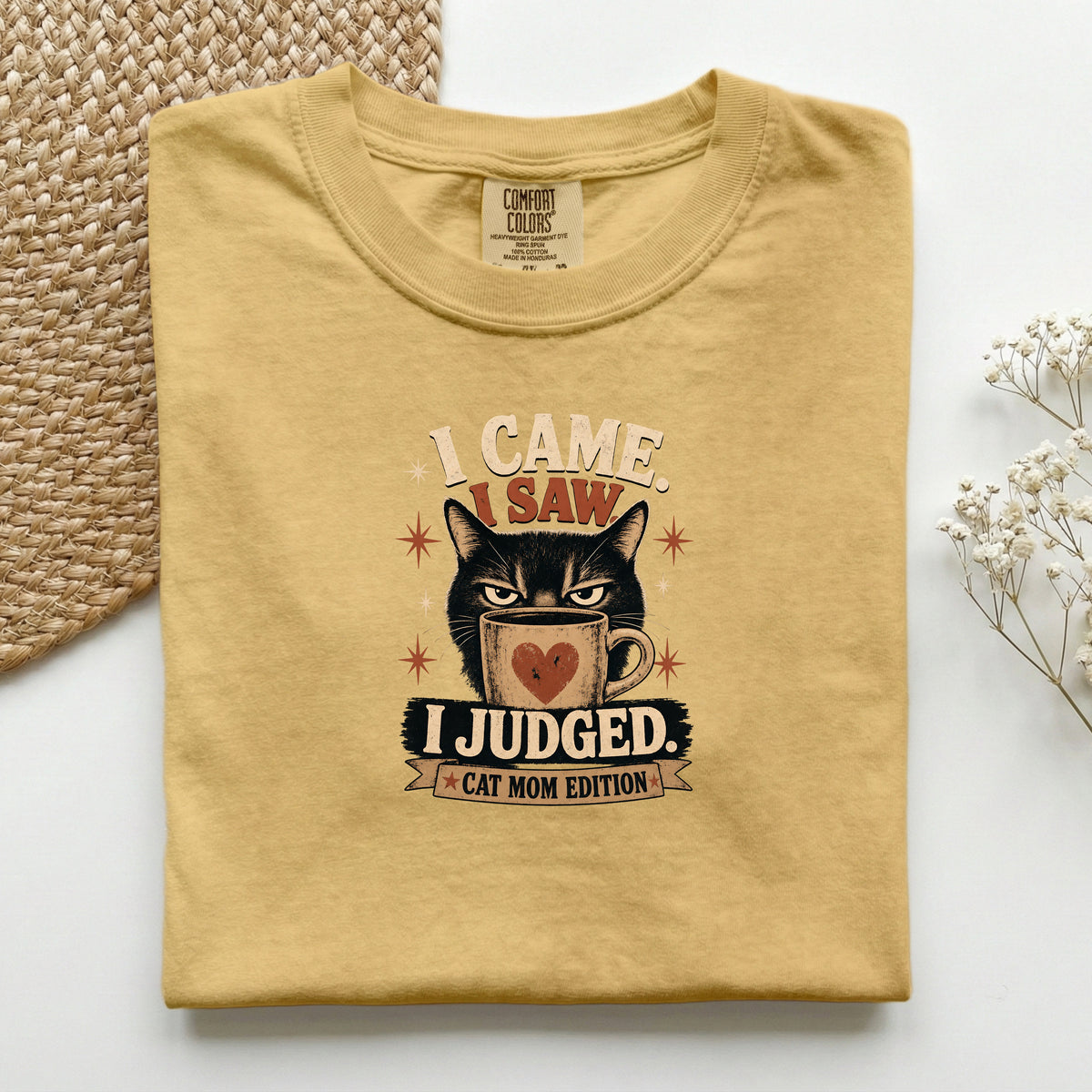 I Came I Saw I Judged graphic tee in Mustard, folded flat lay