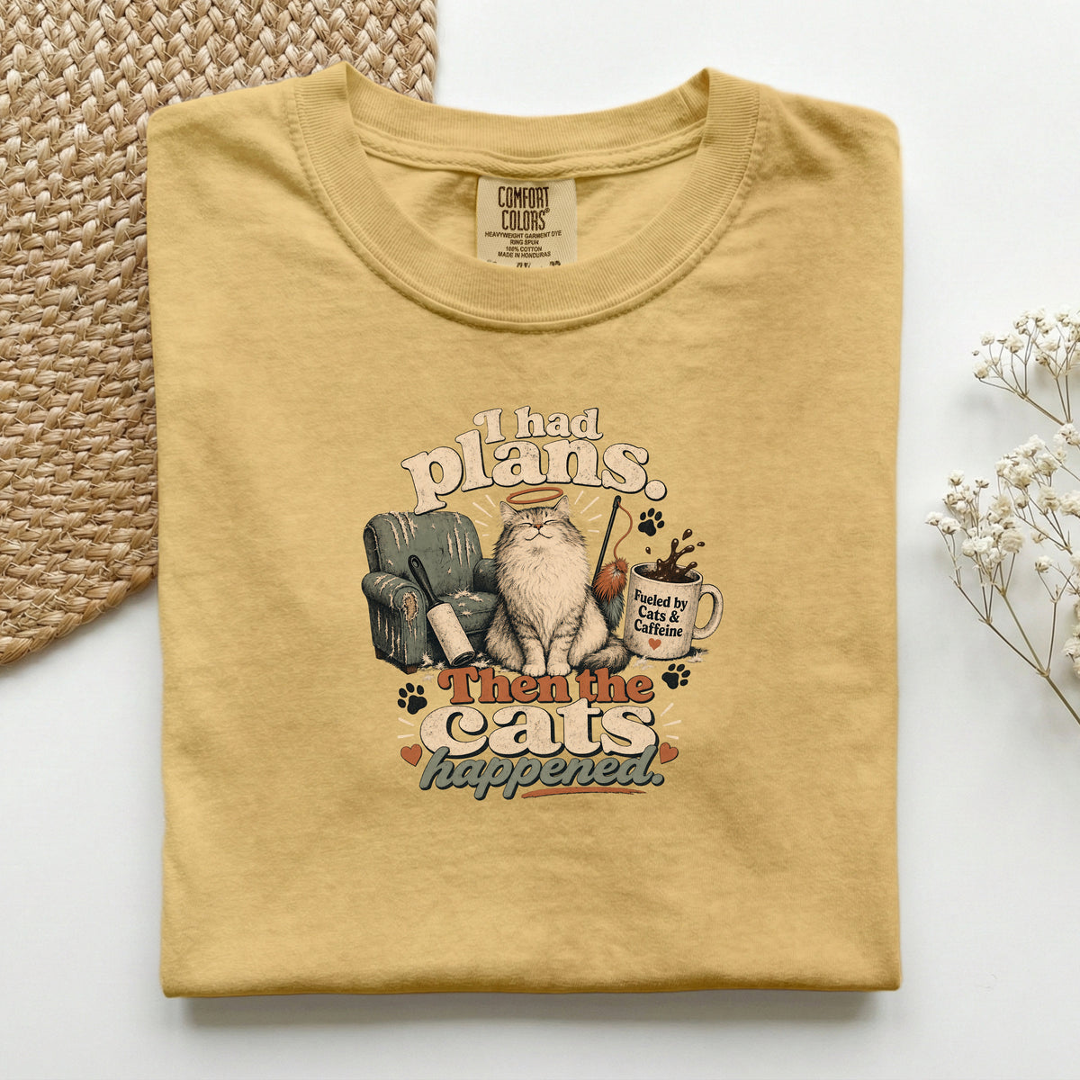 I Had Plans Then The Cats Happened graphic tee in Mustard, folded flat lay