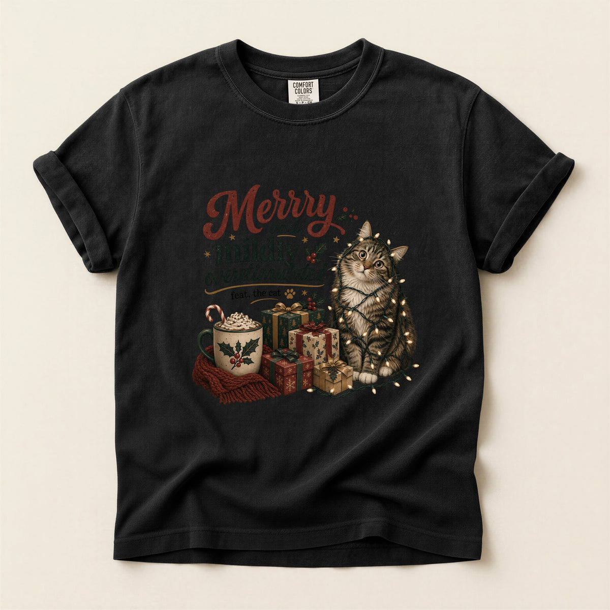 Merry and Mildly Overstimulated graphic tee in Black, folded flat lay