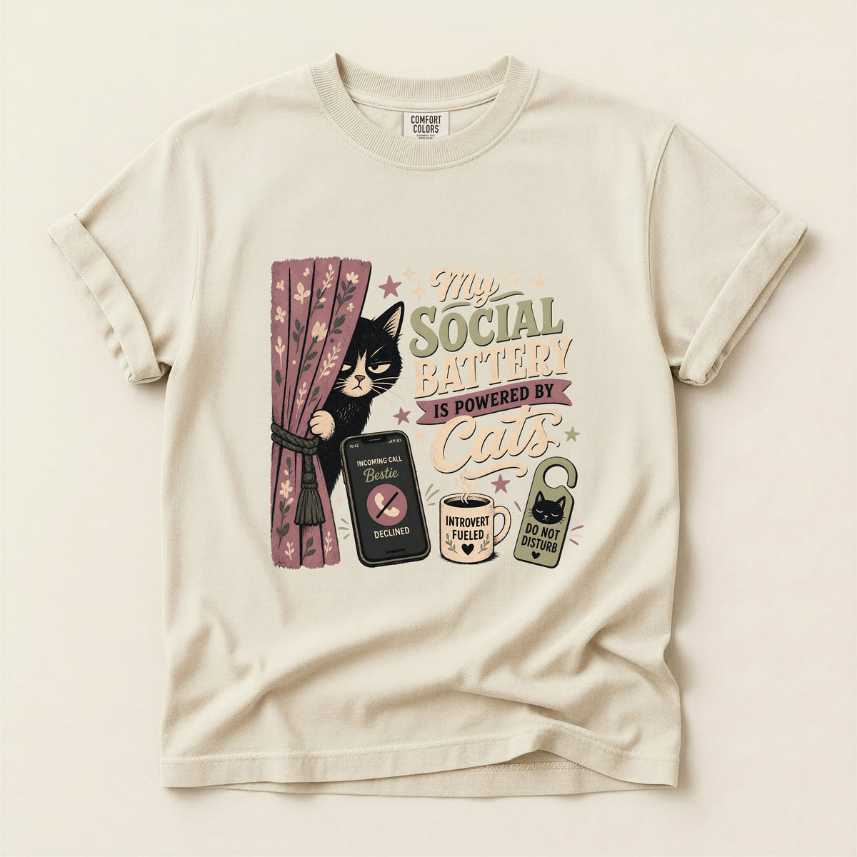 My Social Battery Is Powered By Cats graphic tee in Ivory, folded flat lay