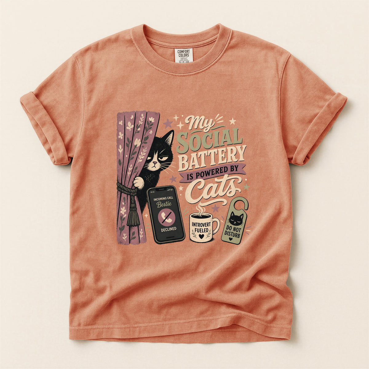 My Social Battery Is Powered By Cats graphic tee in Terracotta, folded flat lay