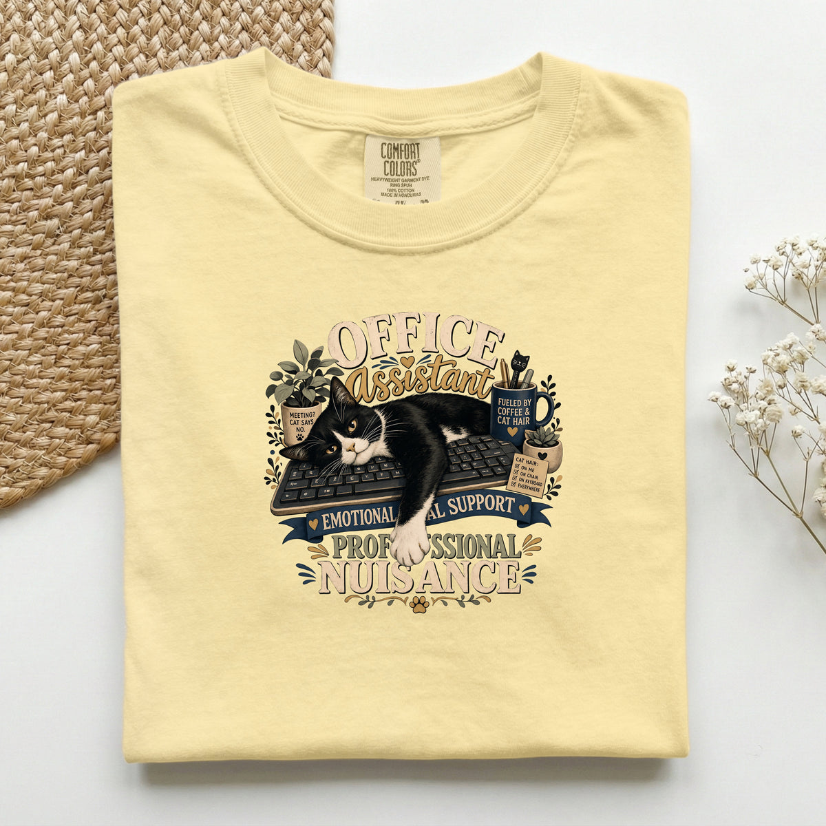 Office Assistant graphic tee in Butter, folded flat lay