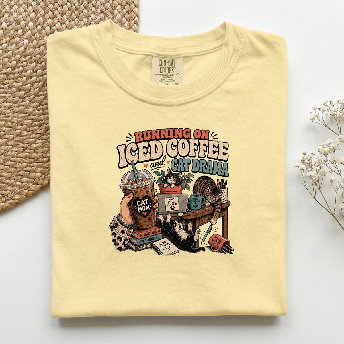 Running On Iced Coffee & Cat Drama graphic tee in Butter, folded flat lay