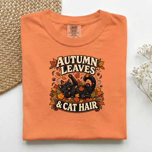 Autumn Leaves & Cat Hair graphic tee in Burnt Orange, folded flat lay