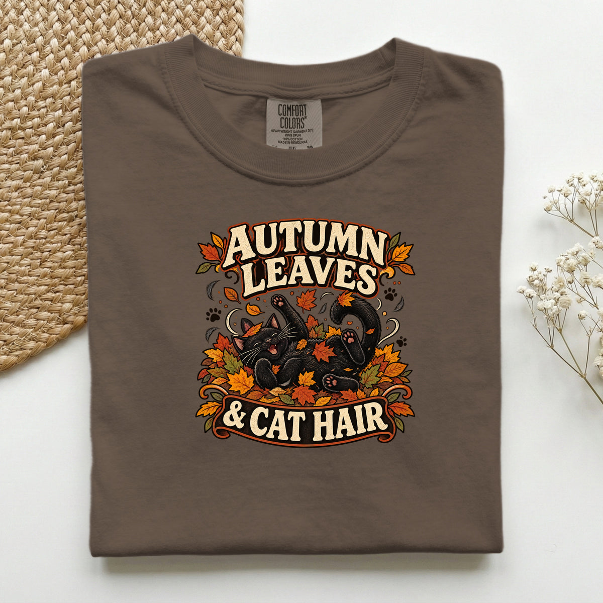 Autumn Leaves & Cat Hair graphic tee in Espresso, folded flat lay