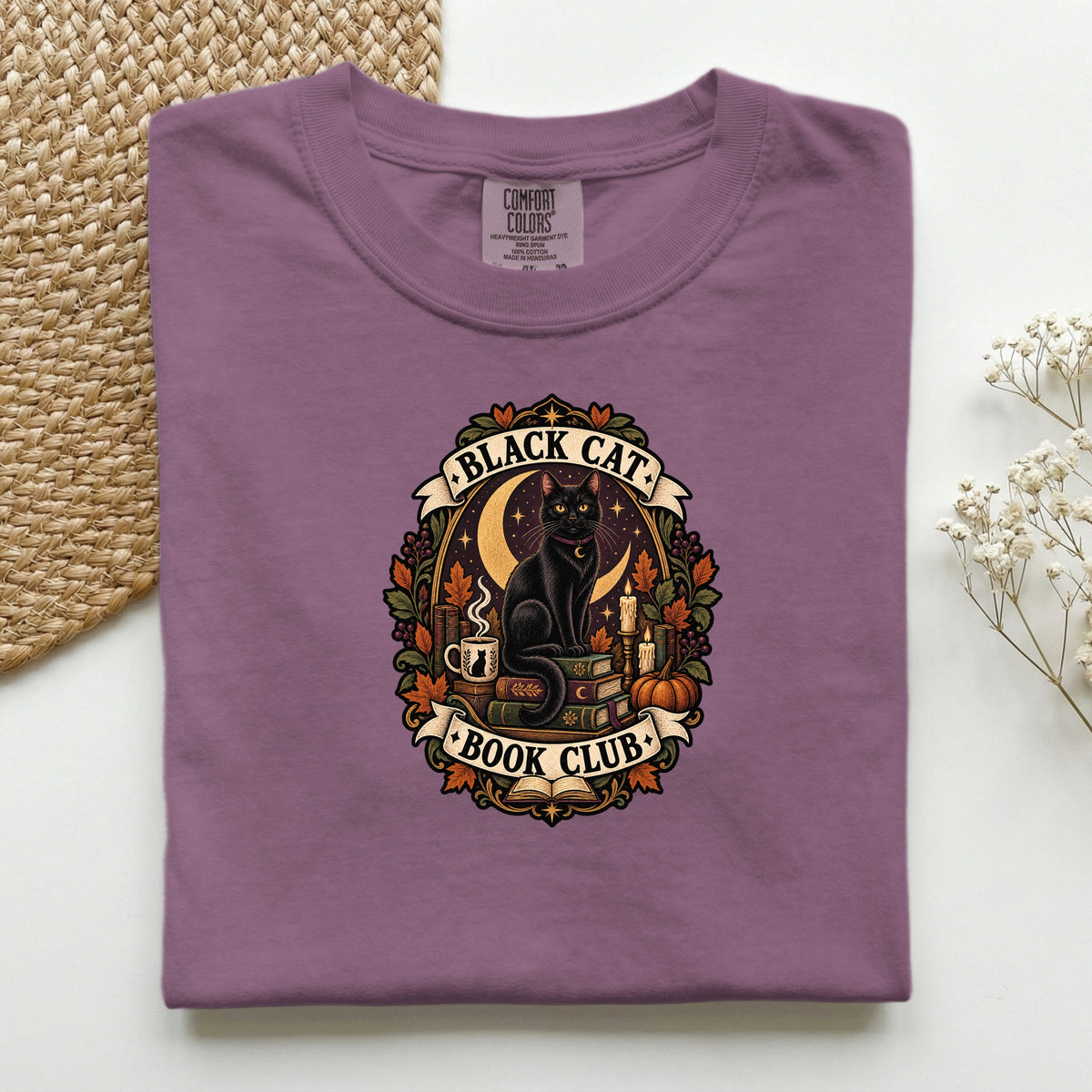 Black Cat Book Club graphic tee in Berry, folded flat lay