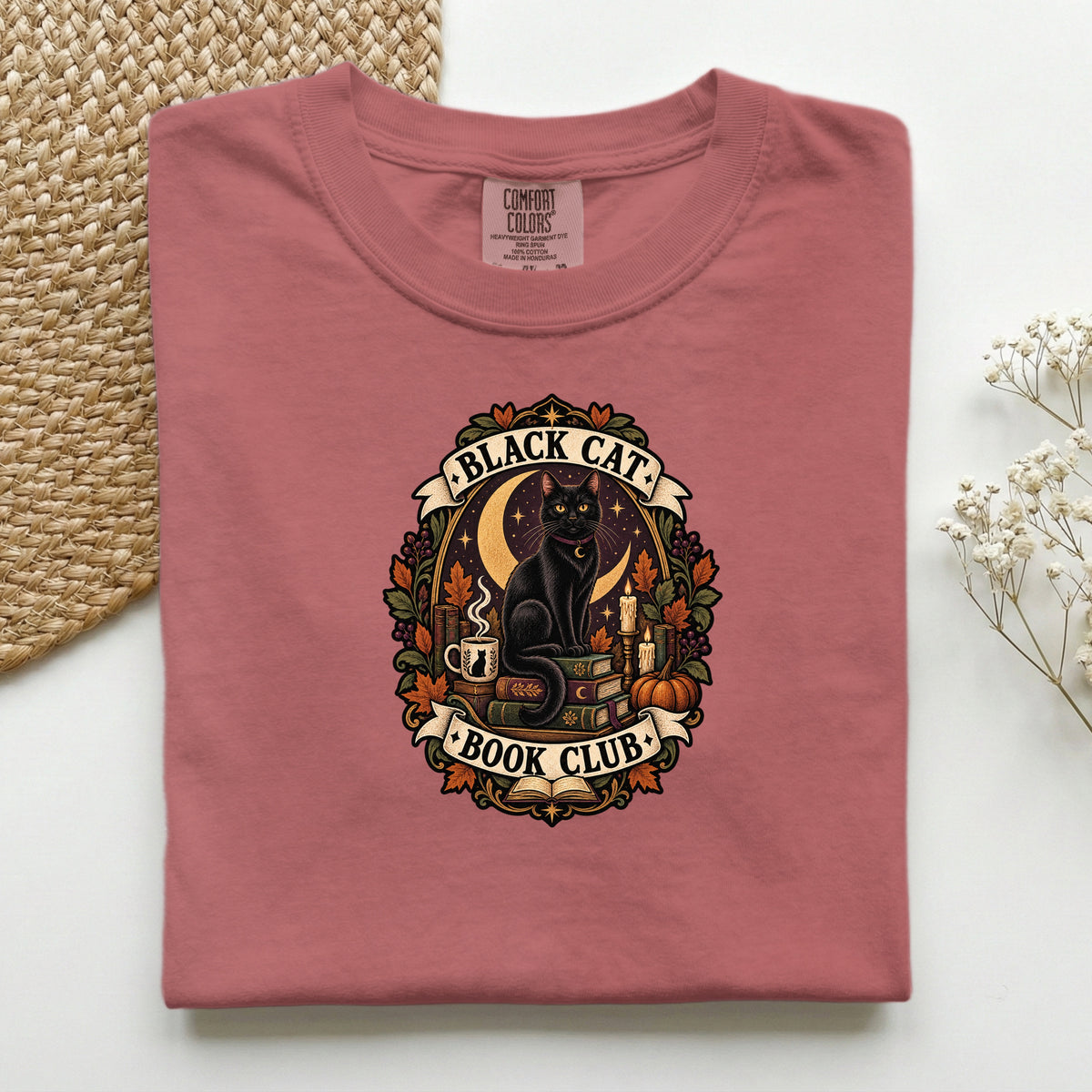 Black Cat Book Club graphic tee in Crimson, folded flat lay
