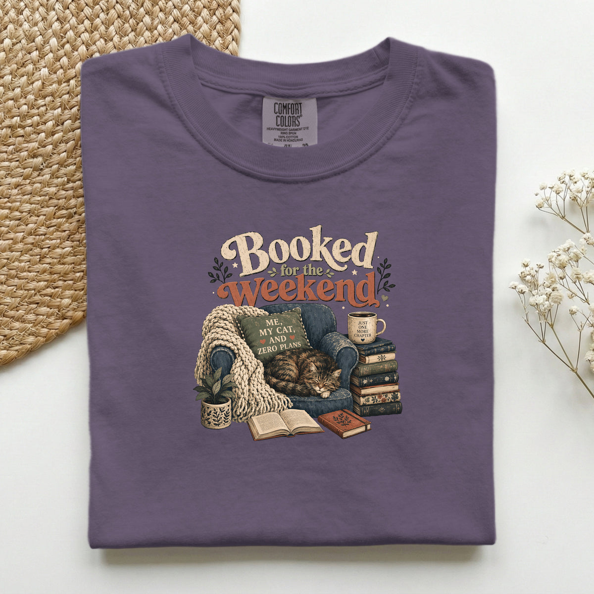 Booked for the Weekend graphic tee in Wine, folded flat lay