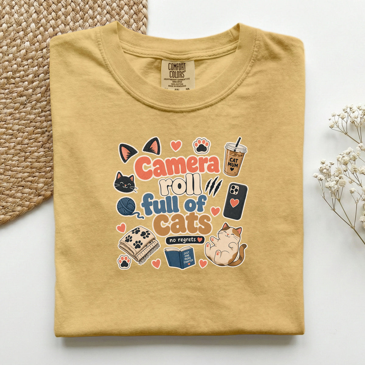 Camera Roll Full Of Cats graphic tee in Mustard, folded flat lay