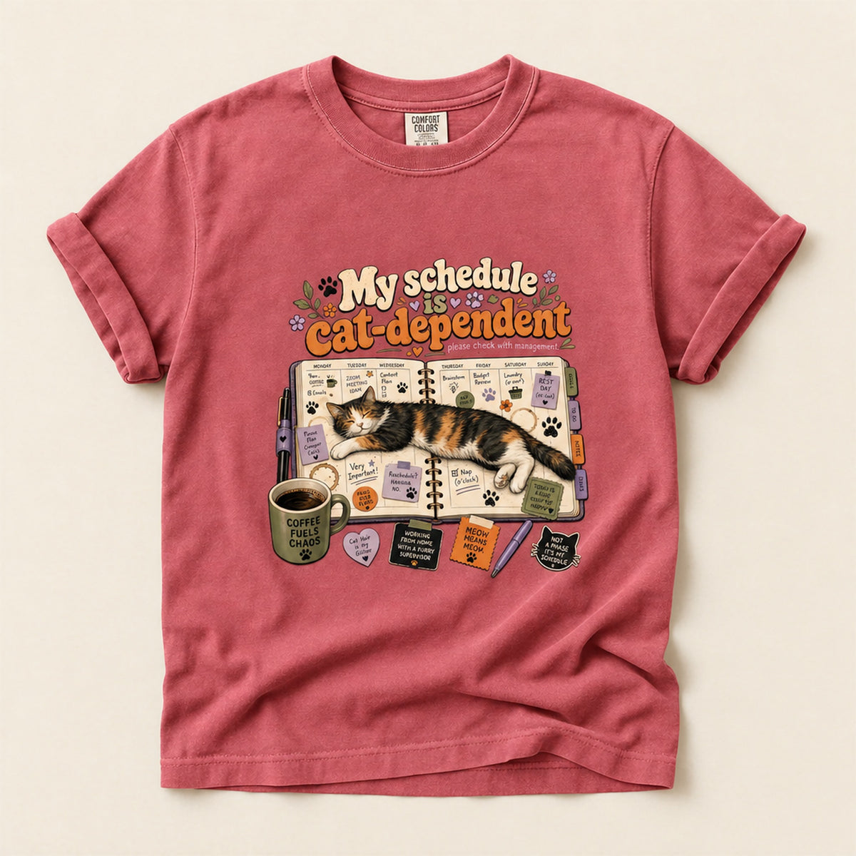 Cat Dependent Schedule graphic tee in Watermelon, folded flat lay