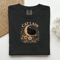 Cat Lady After Dark graphic tee in Black, folded flat lay