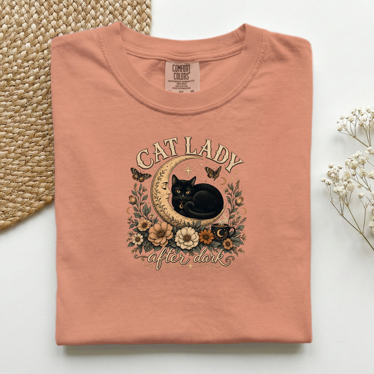 Cat Lady After Dark graphic tee in Terracotta, folded flat lay