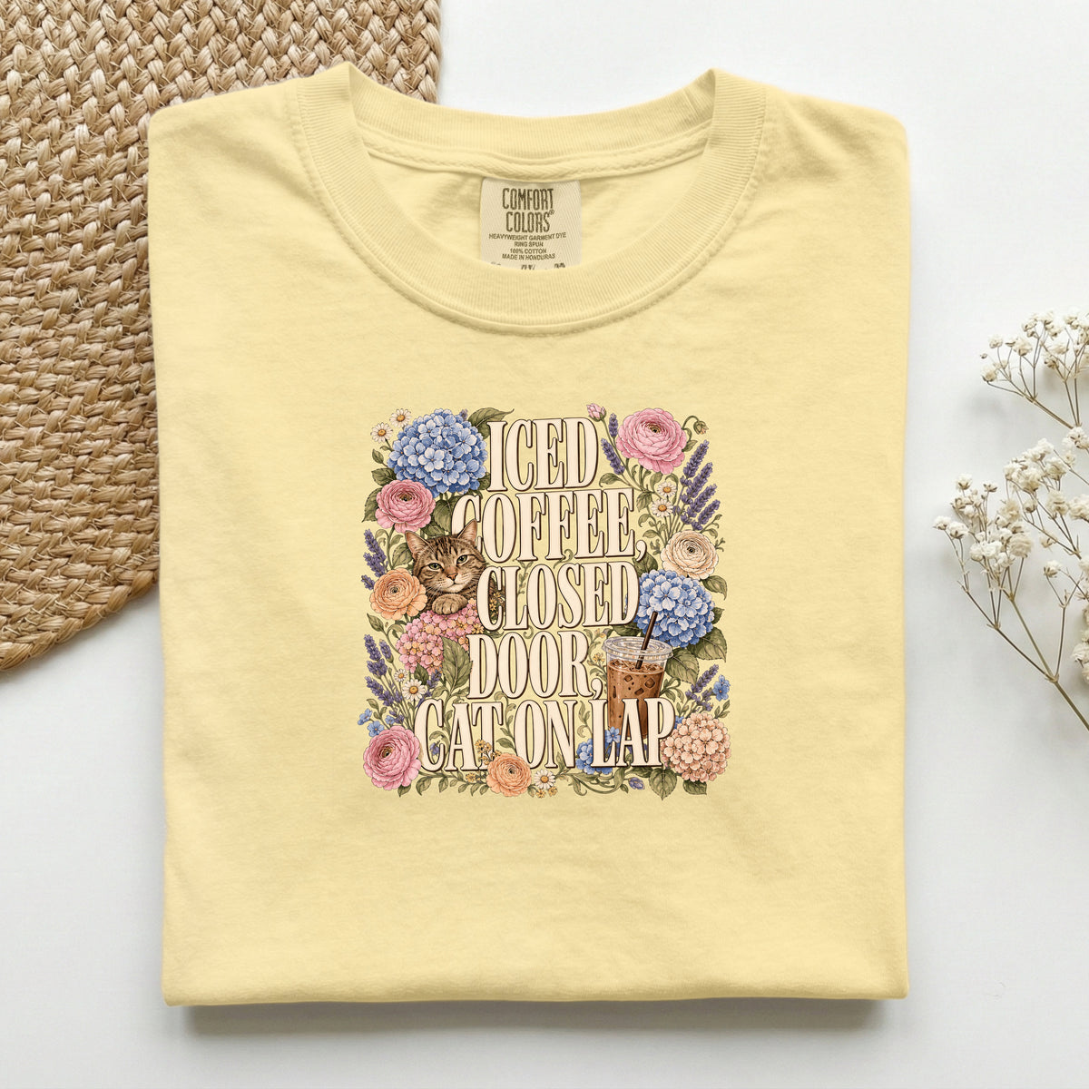 Iced Coffee, Closed Door, Cat On Lap graphic tee in Butter, folded flat lay