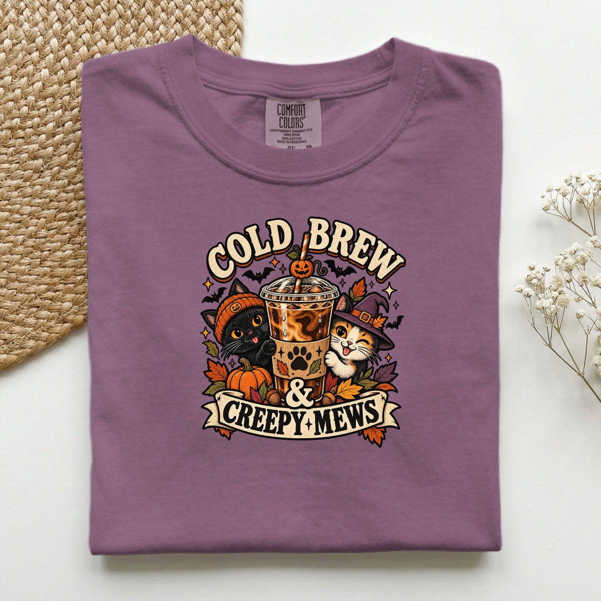 Cold Brew & Creepy Mews graphic tee in Berry, folded flat lay