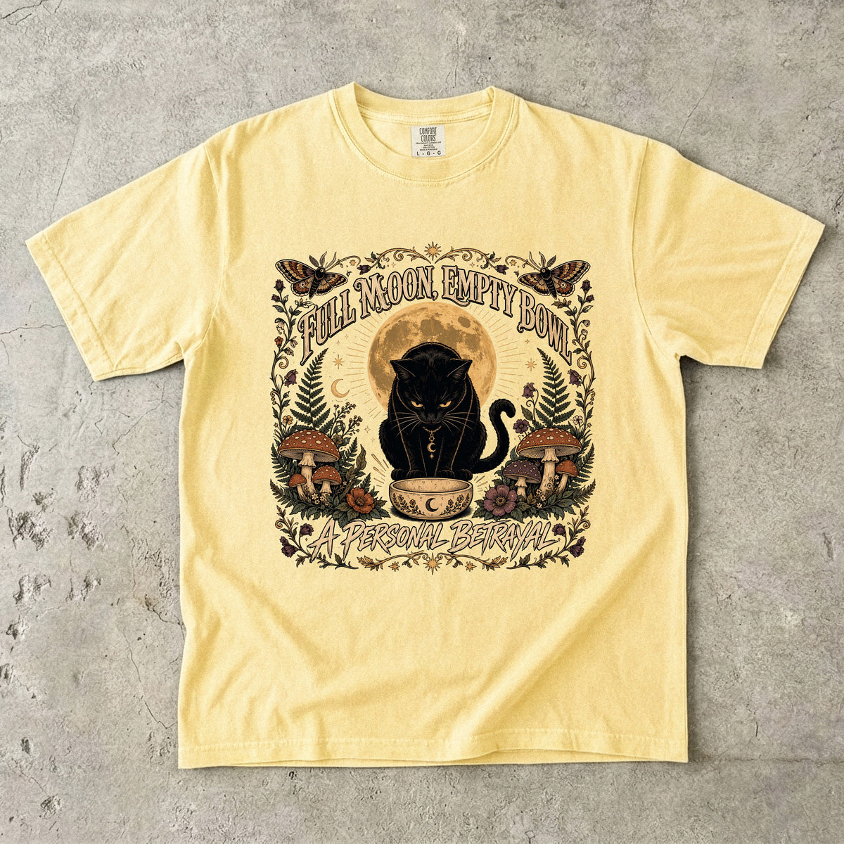 Full Moon Empty Bowl graphic tee in Butter, folded flat lay