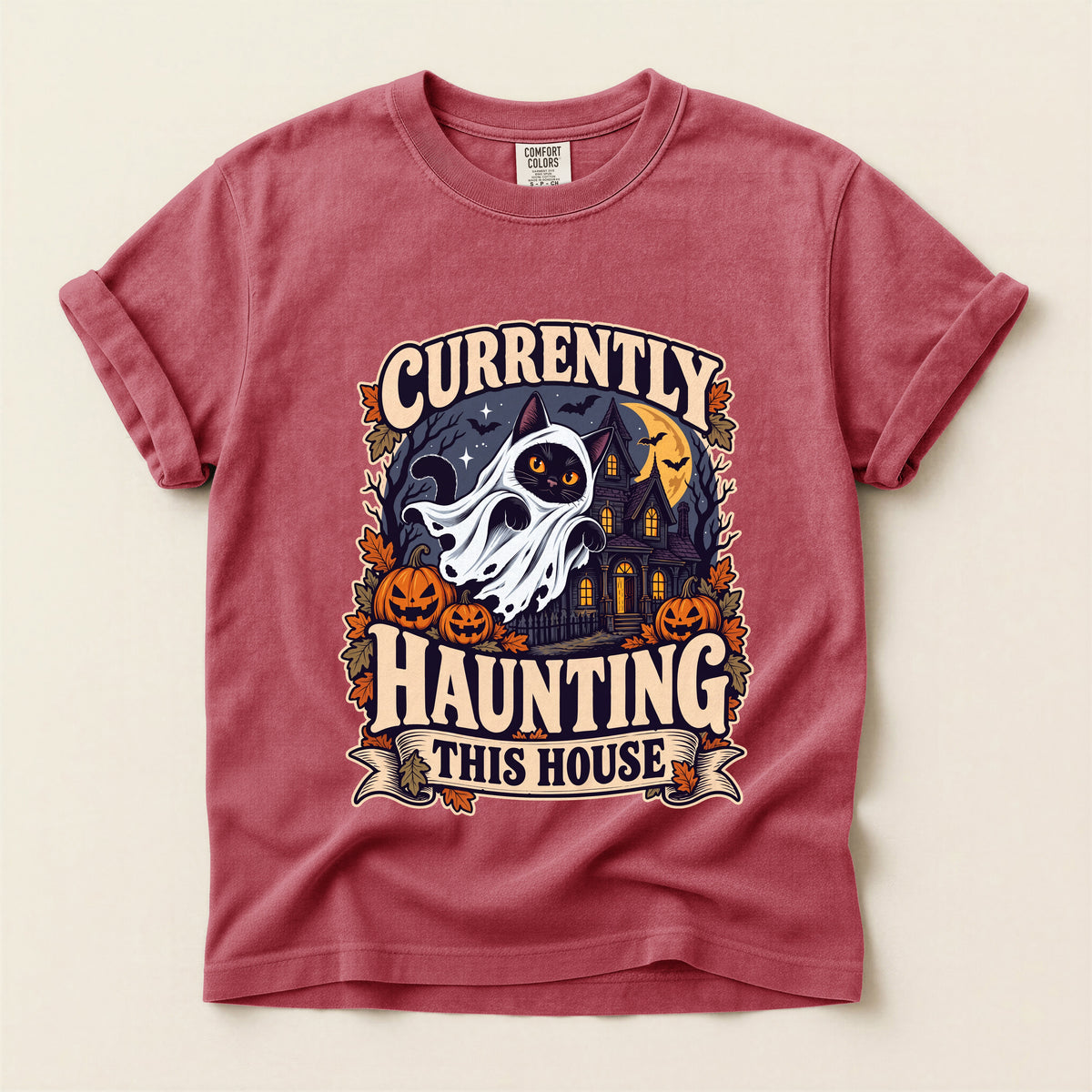 Currently Haunting This House graphic tee in Crimson, flat lay