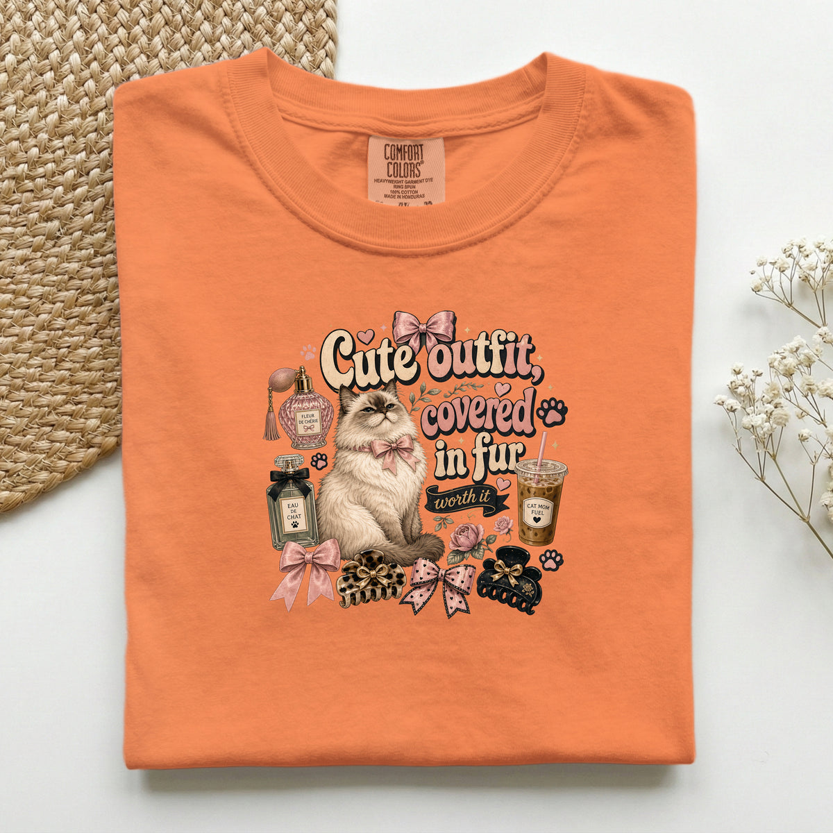 Cute Outfit Covered In Fur graphic tee in Burnt Orange, folded flat lay