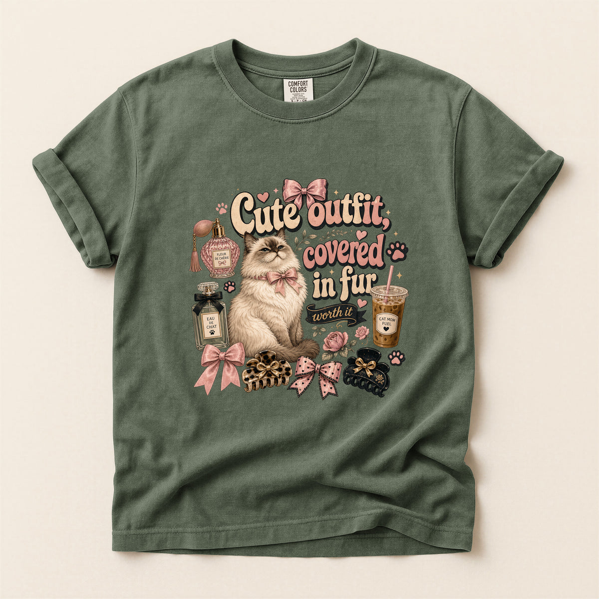 Cute Outfit Covered In Fur graphic tee in Moss, folded flat lay