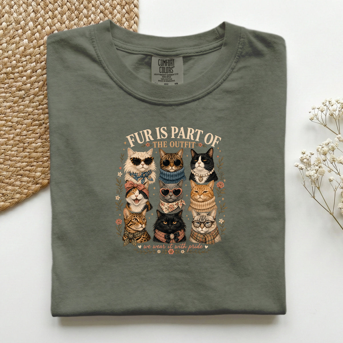 Fur Is Part Of The Outfit graphic tee in Moss, folded flat lay