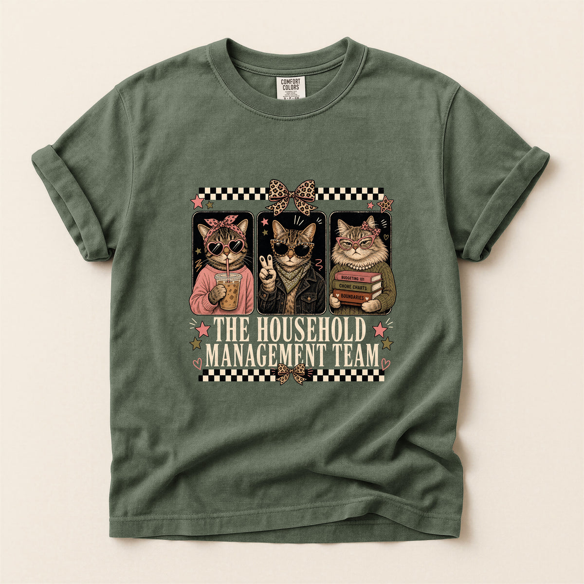 The Household Management Team graphic tee in Moss, folded flat lay