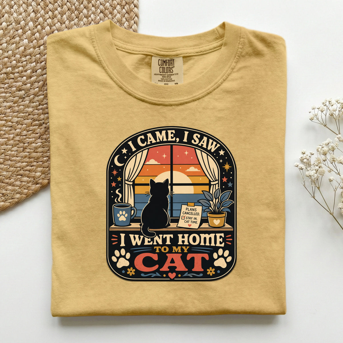 I Came I Saw I Went Home to My Cat graphic tee in Mustard, folded flat lay