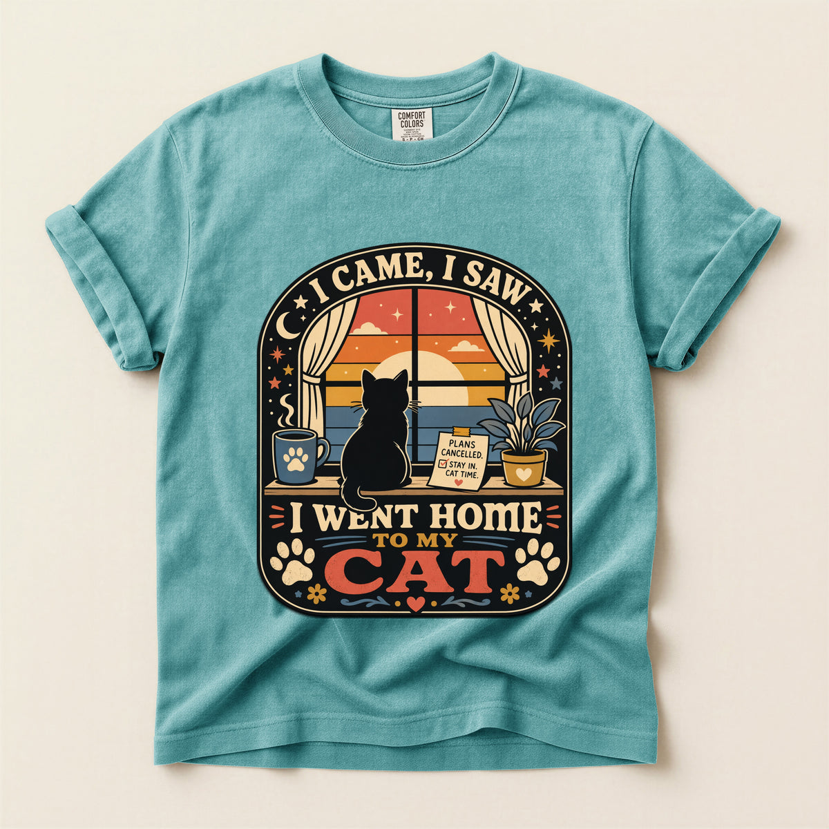 I Came I Saw I Went Home to My Cat graphic tee in Seafoam, folded flat lay