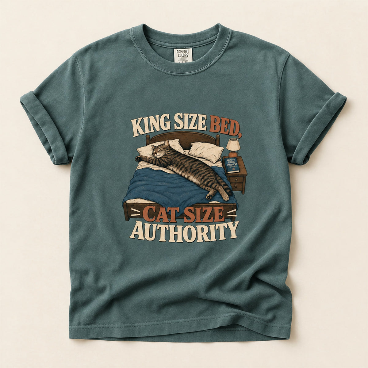 King Size Bed Cat Authority graphic tee in Blue Spruce, folded flat lay