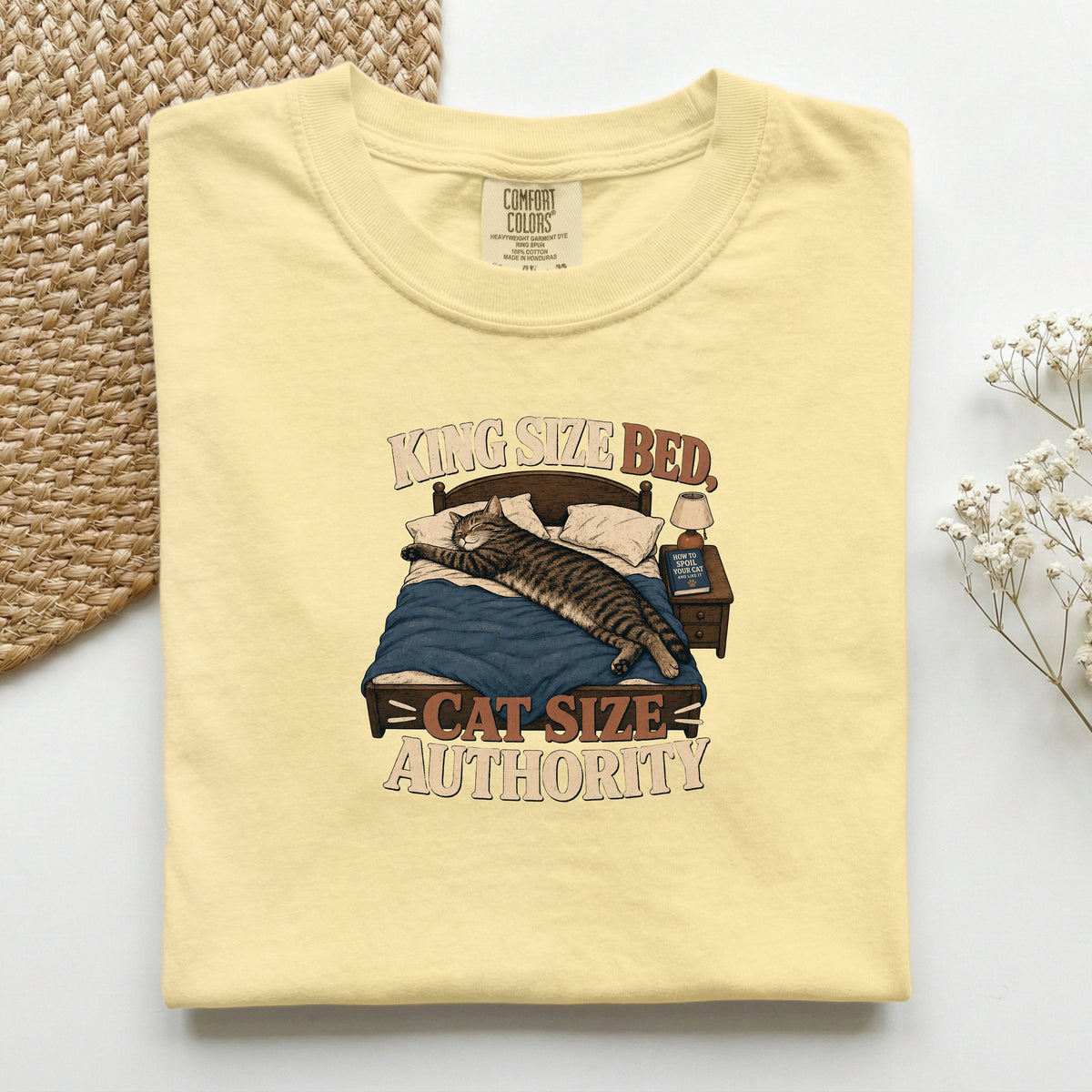 King Size Bed Cat Authority graphic tee in Butter, folded flat lay