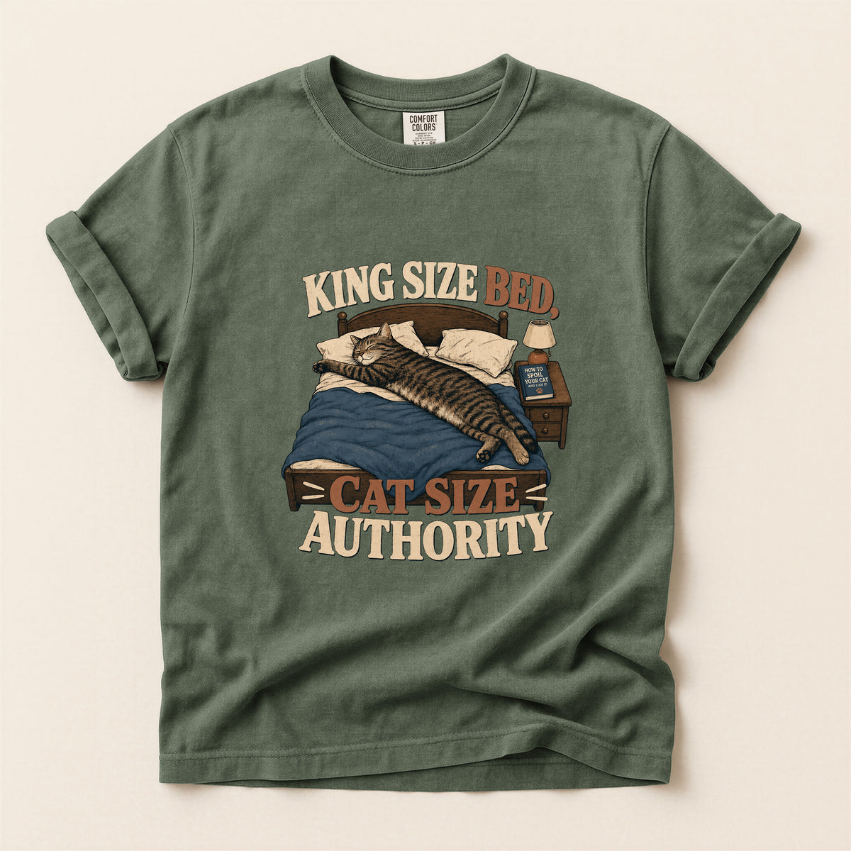 King Size Bed Cat Authority graphic tee in Moss, folded flat lay