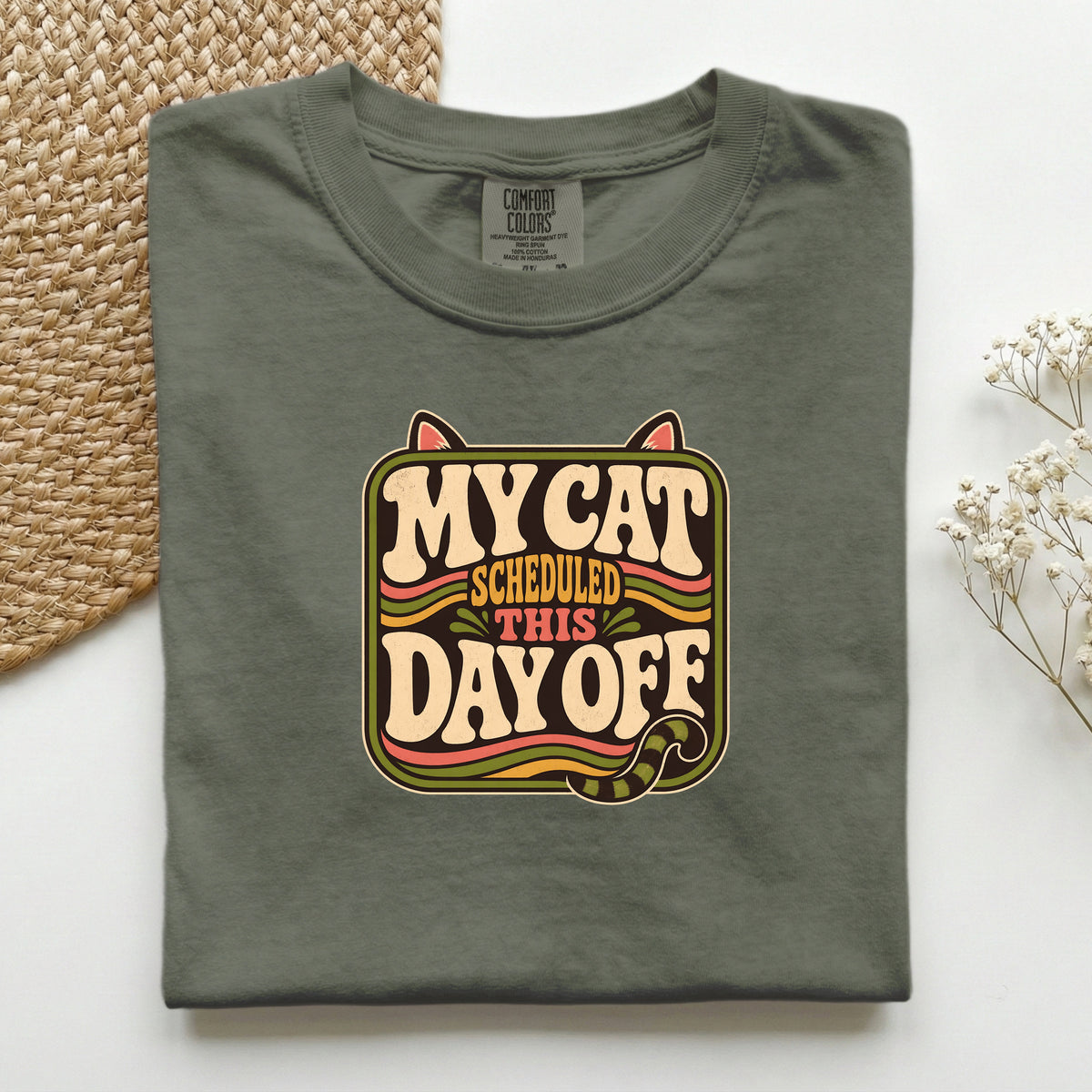 My Cat Scheduled This Day Off graphic tee in Moss, folded flat lay