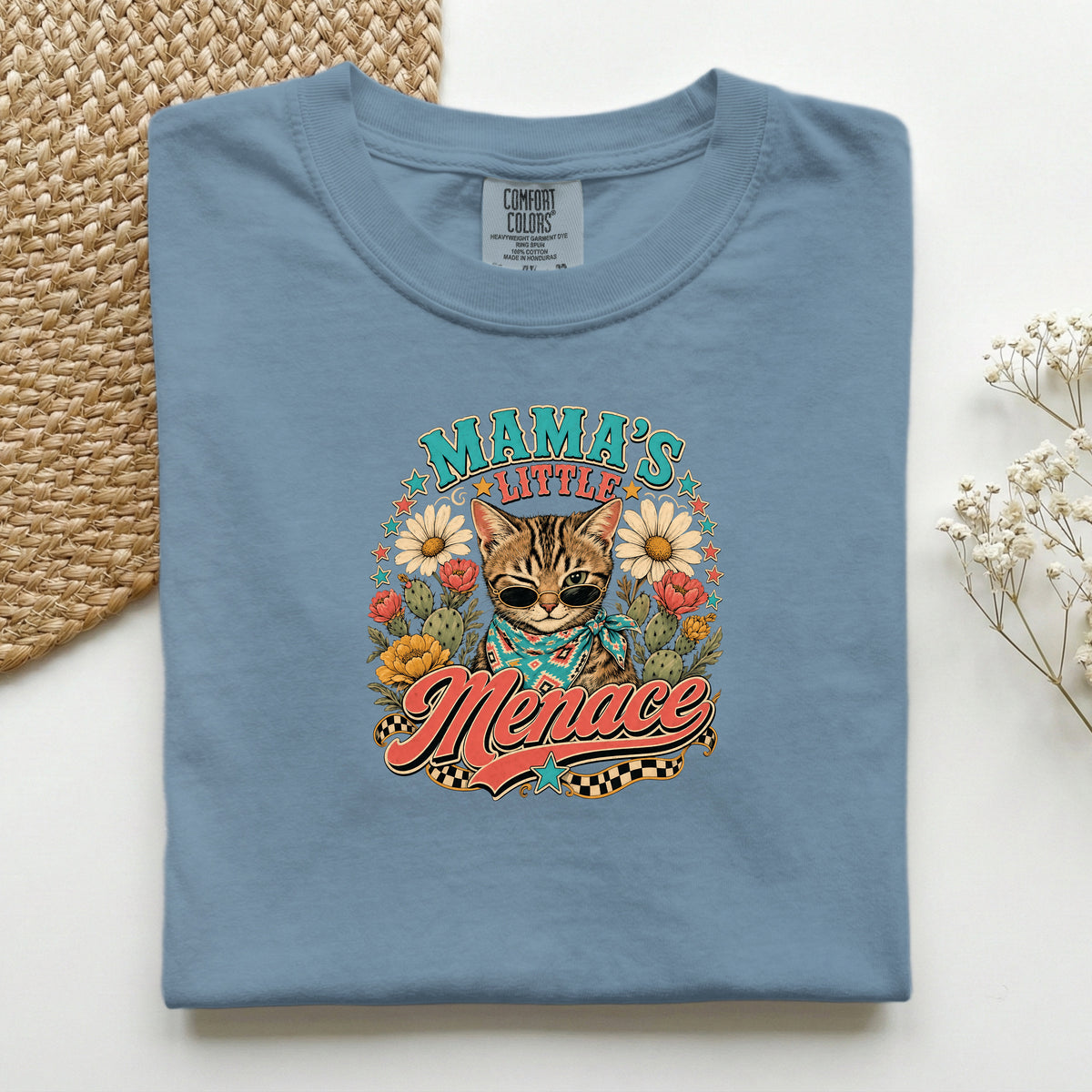 Mama's Little Menace graphic tee in Blue Jean, folded flat lay