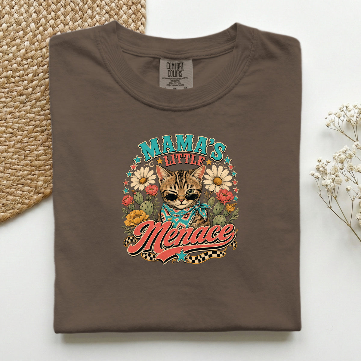 Mama's Little Menace graphic tee in Espresso, folded flat lay