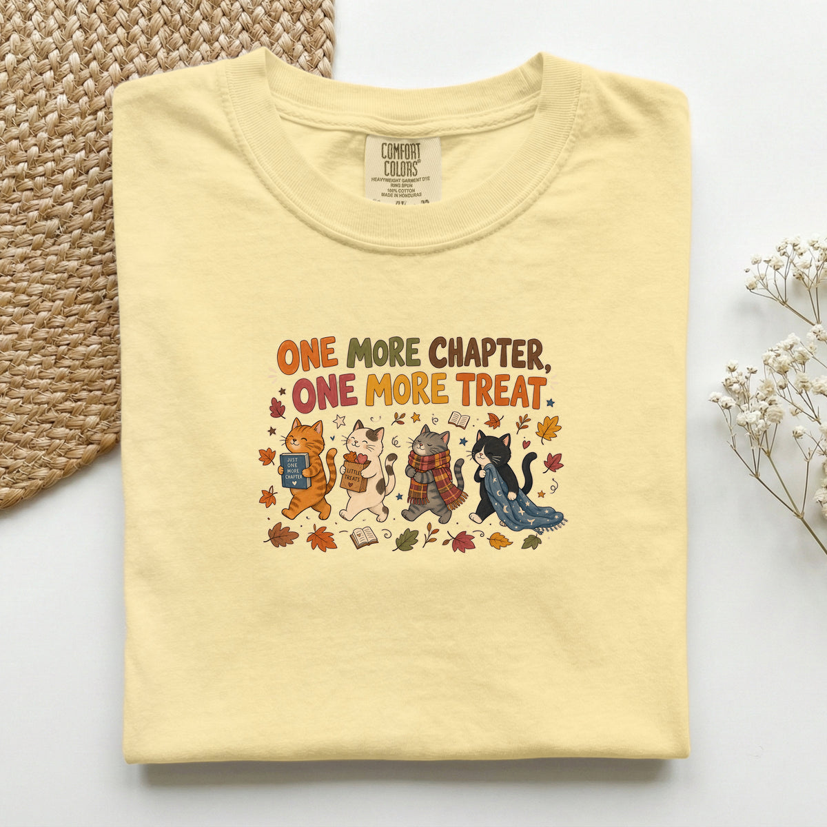 One More Chapter One More Treat graphic tee in Butter, folded flat lay