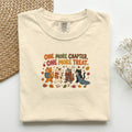 One More Chapter One More Treat graphic tee in Ivory, folded flat lay