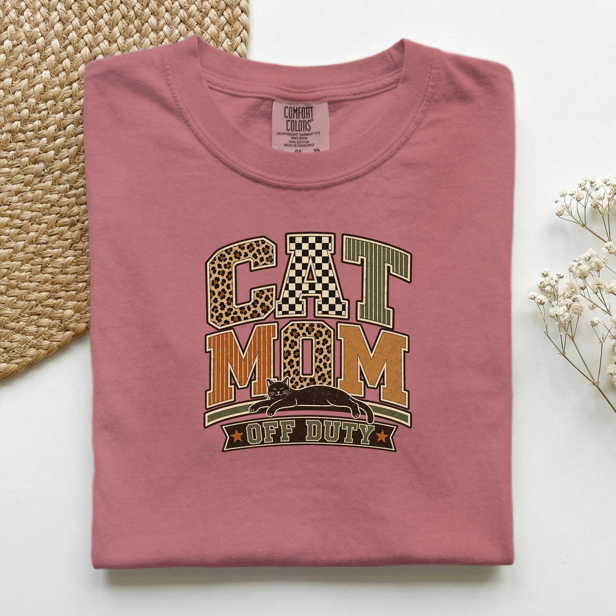 Cat Mom Off Duty graphic tee in Brick, folded flat lay