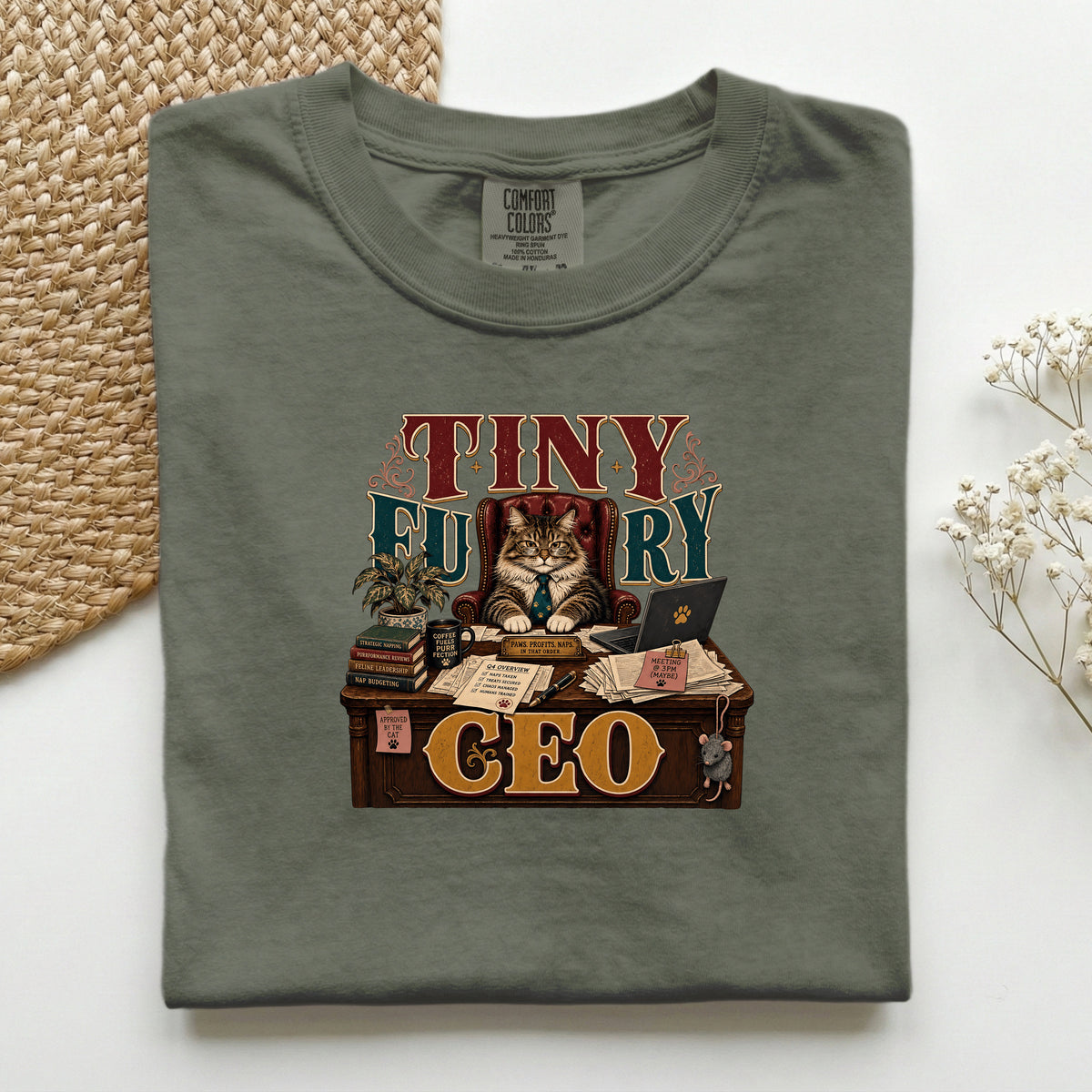 Tiny Furry CEO graphic tee in Moss, folded flat lay