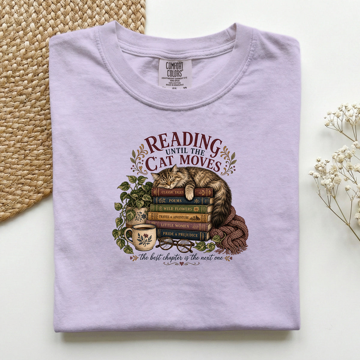 Reading Until The Cat Moves graphic tee in Orchid, folded flat lay